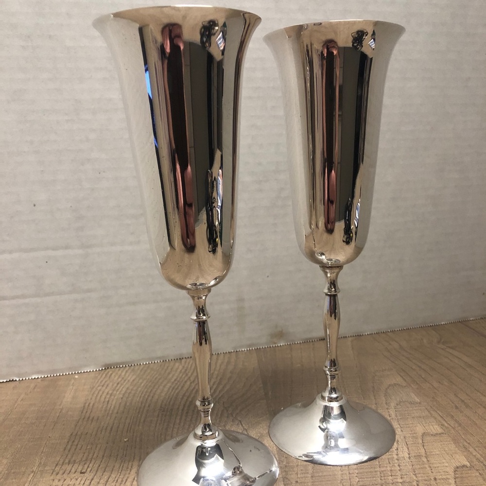Silver plated toasting glasses.